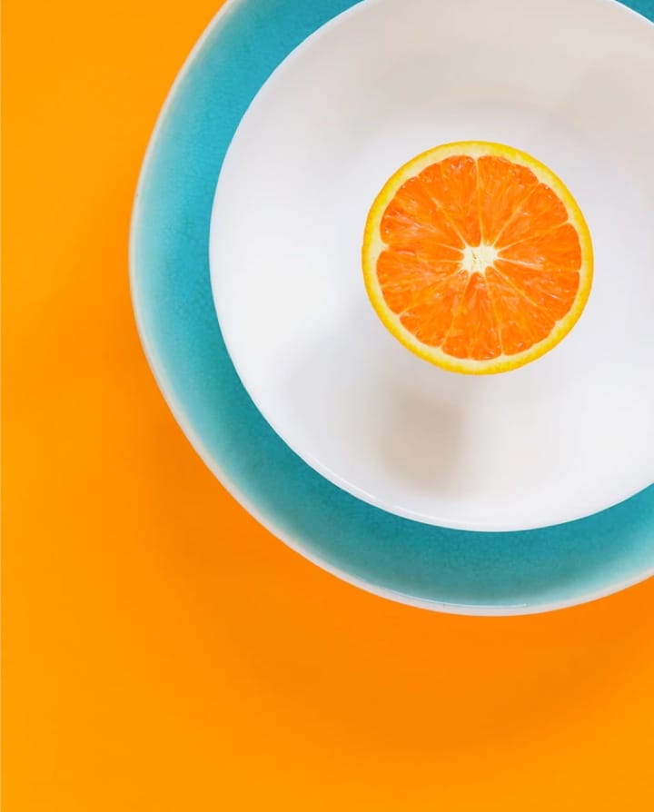 top view of orange on plate